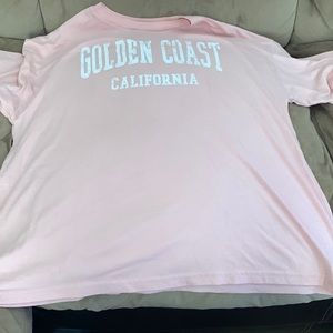 Flirtitude pink tshirt with Golden coast California is printed on chest size m